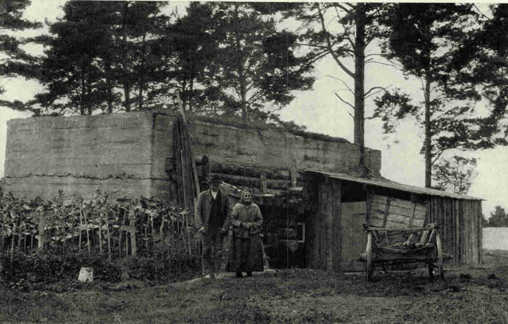 An Old Couple, Living in A Former Gun Emplacement Southwest of RigaMany of the small farmers, who formerly cultivated plots belonging to the Baltic barons, arc now tilling their own soil. More than 10,000 of them to-day arc raising flax, hay and vegetables, or cattle and bees on land which has been taken from the Russian Crown properties and from large estates (see text, page 424).Photograph by Maynard Owen Williams