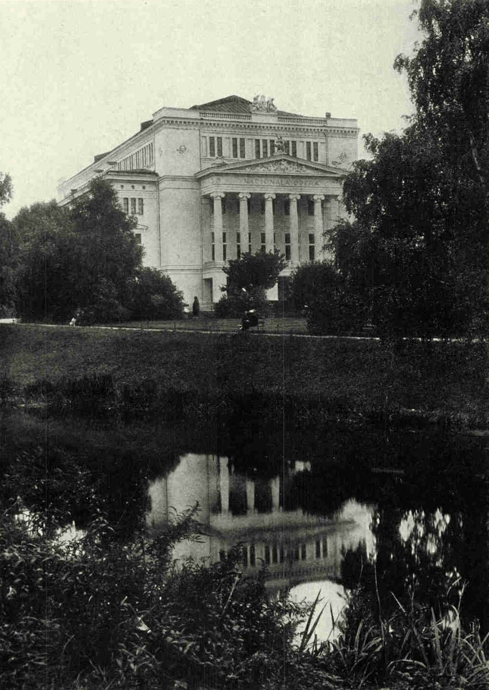 The National Opera of Riga From across The Canal Which Divides The Old City from The NewOne real pride of the Opera from the Lettish standpoint is that German. French, and Italian have been abolished from the librettos and the words are now sung in Lettish (see text, page 409), a storm of national patriotism having overtaken the Letts, who have won their independence after having cherished it as a subject people for 700 years.Photograph by Maynard Owen Williams