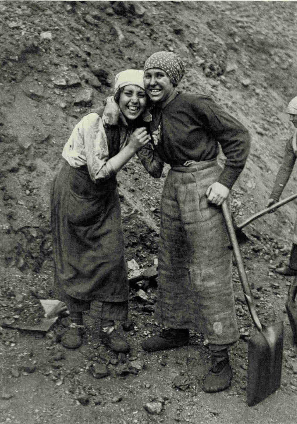 Lithuanian Coal-Shovelers at The Port of LiepajaSo closely do the neighboring Lithuanians and Letts resemble each other in personal appearance, language, occupations, and the hardships of life that foreigners usually identify them as one.Photograph by Ernest Peterfly