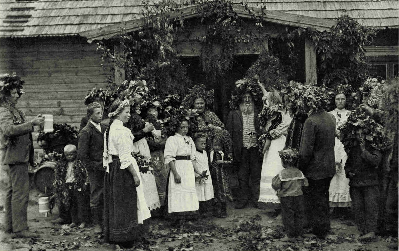 Celebrating The Feast of Sint John's Day, One of The Merriest of Latvian HolidaysOn the 23d of June country wagons bring great loads of leafy boughs into town for Saint John's Eve, when young and old participate in the festivities. They wraathe their heads with garlands, the farmers fix on poles small barrels filled with wood or tar and ignite them, and the farmers' wives serve great quantities of flag, round cheeses, called Saint John's Day cheese, to be consumed in the intervals between the singing and dancing.Photograph by J. Reeksta
