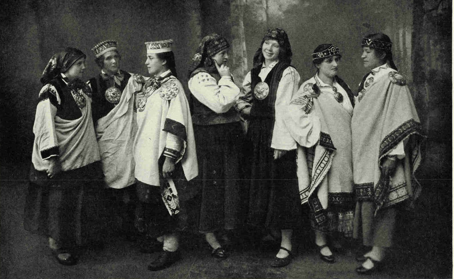 Beautiful Old Lettish Costumes, No Longer Generally WornThe traditional attire of the Letts was conspicuous for its richly embossed breast buckles and coronet-shaped headdress, several varieties of which may still be seen occasionally in the Liepaja district, where the ancient costumes are sometimes worn on festive occasions, such as this.Photograph by Ernest Peterfly
