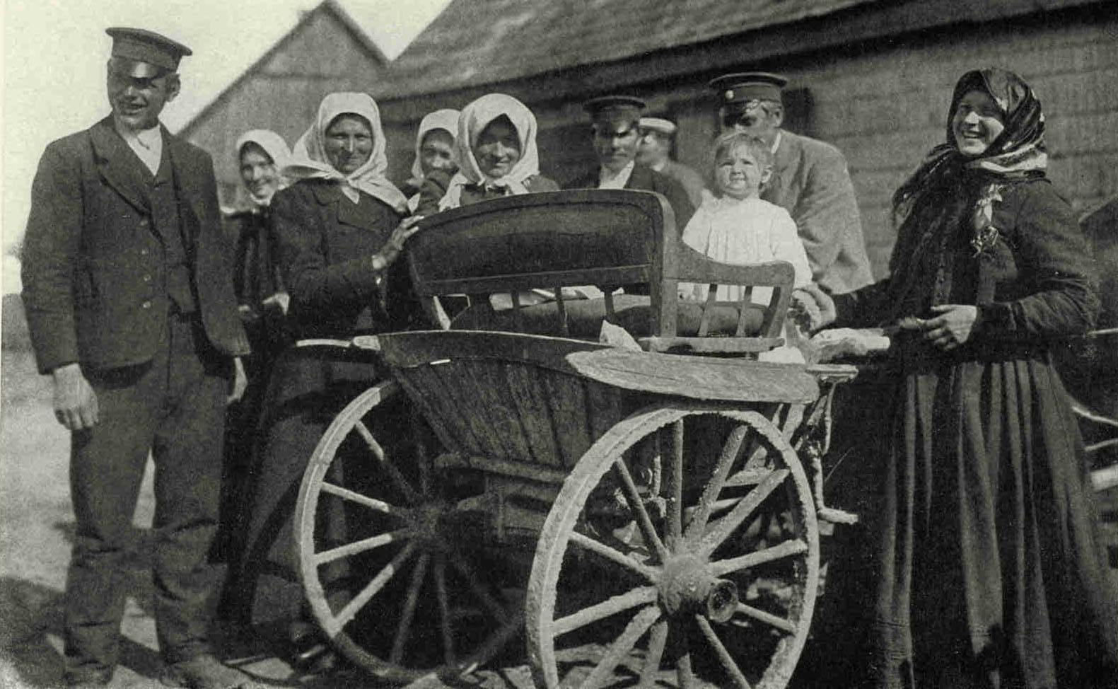 A Happy Group From RucavaThe Latvian women seldom wear brightly colored garments, but dress for the most part for comfort in dark, inconspicuous colors, but the women of Rucava have attained distinction for their beautiful homespun cloths and embroideries.Photograph by J. Reeksta